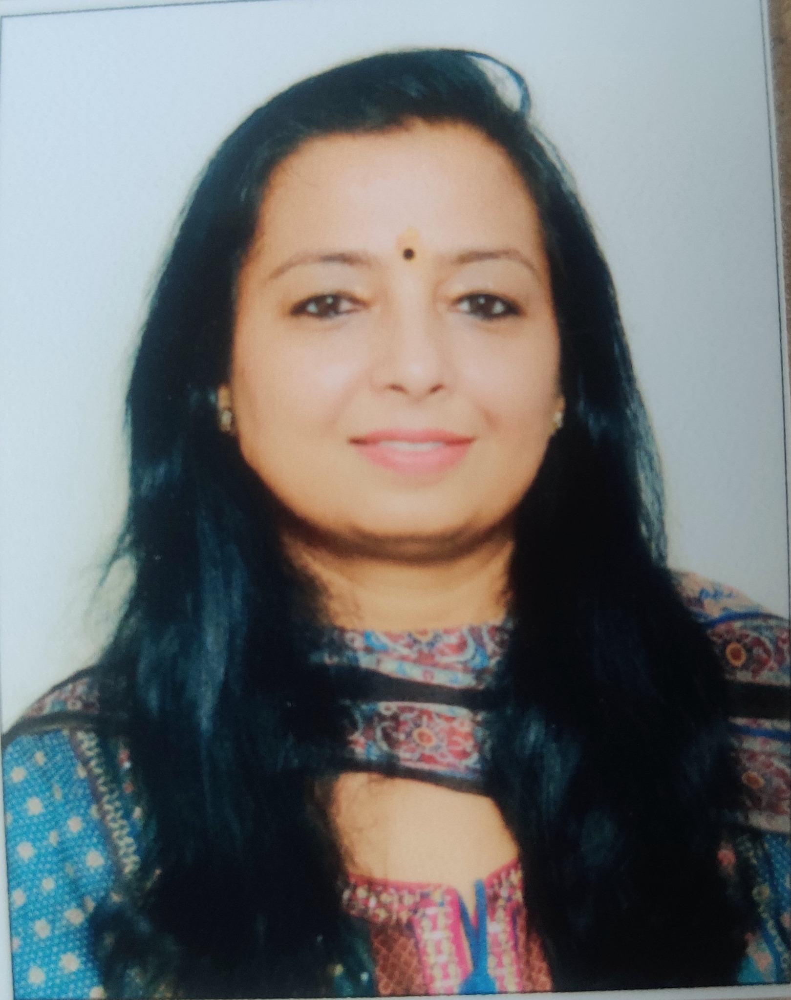Dr. Neelika Arora